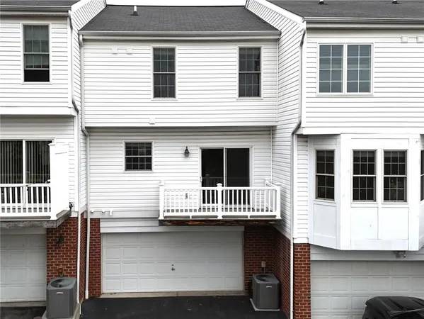 a view of a house with a balcony