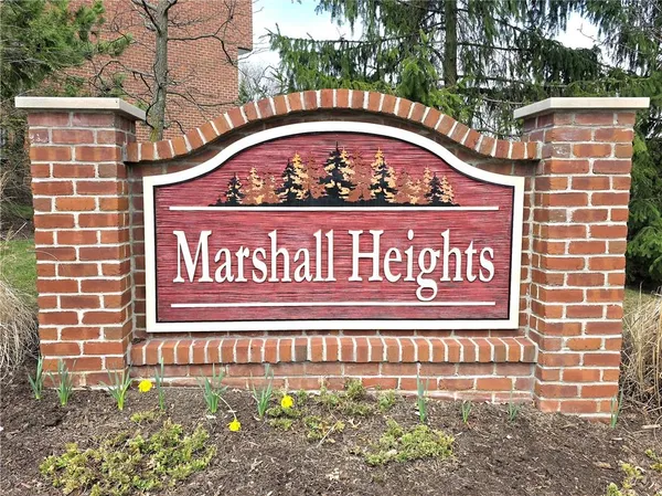 a sign that is on the side of a building