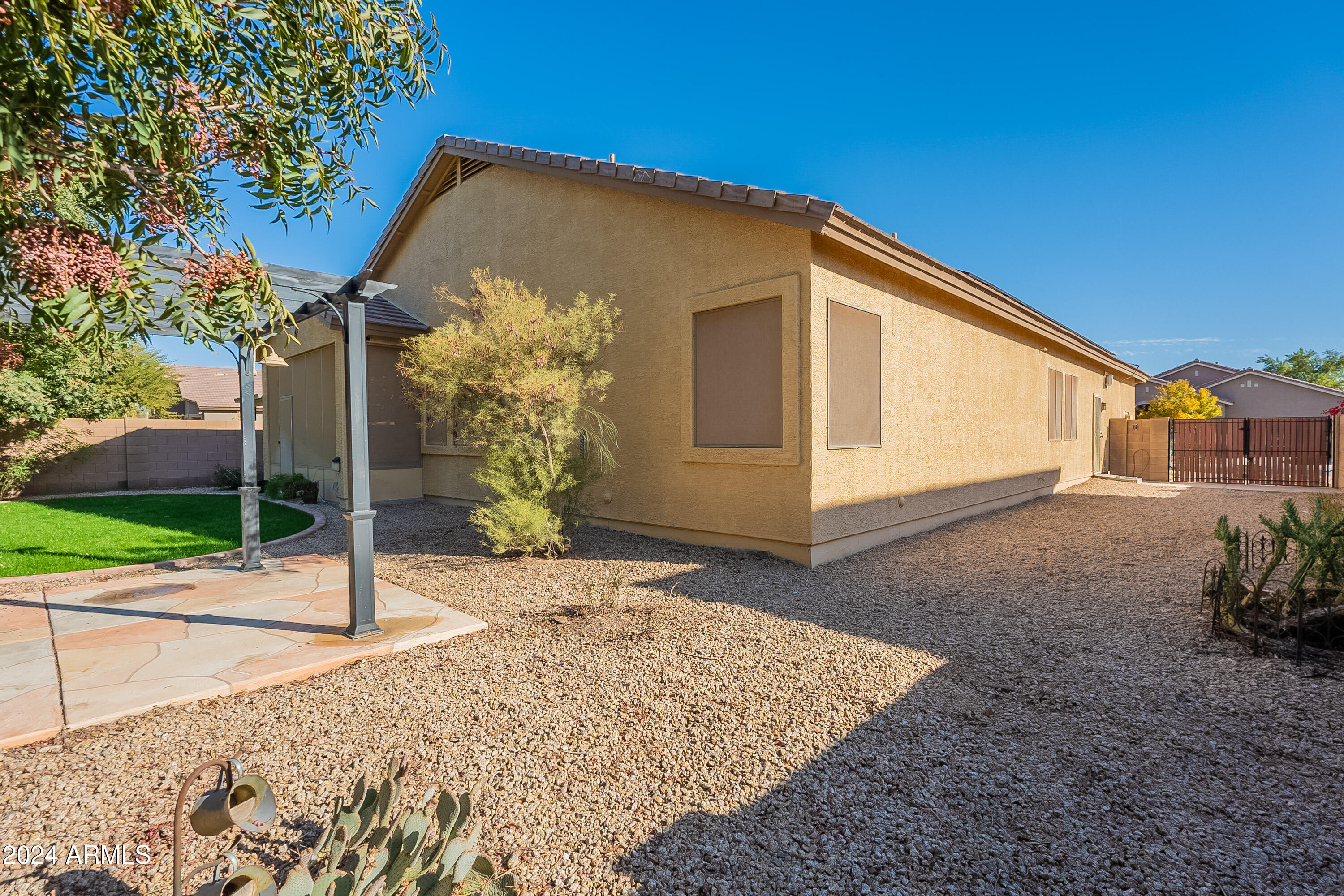 43366 West Venture Road Maricopa, AZ 85138 - Photo 16 of 18 Backyard view with Desert Landscaping