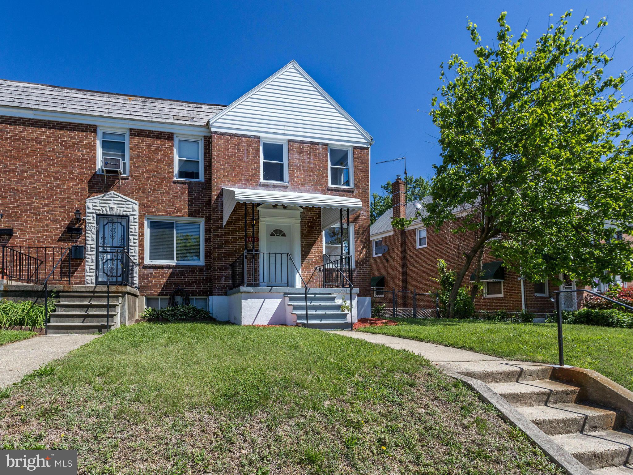4400 Eldone Road Baltimore, MD 21229 - Photo 2 of 30 front view of a house with a yard