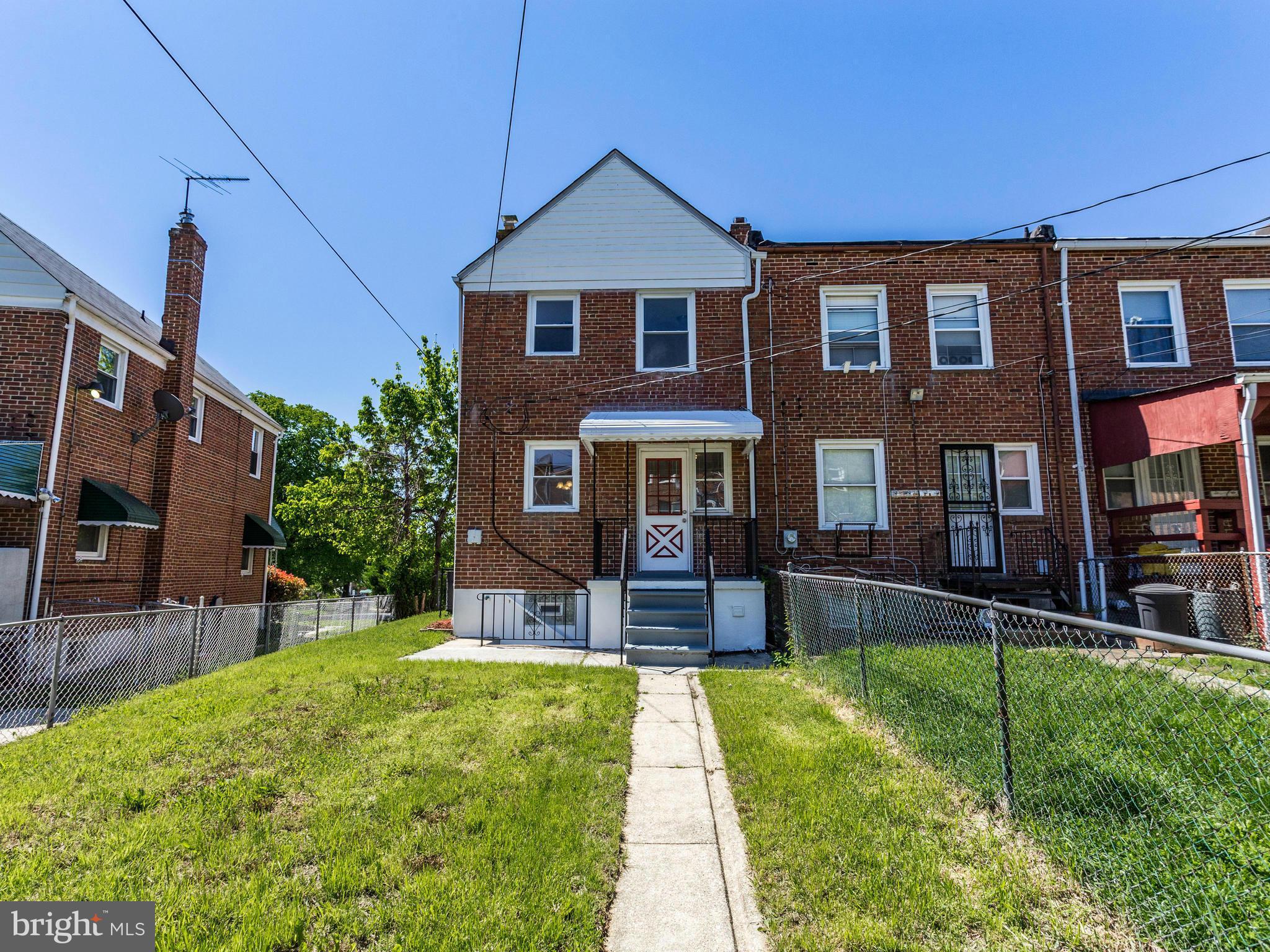 4400 Eldone Road Baltimore, MD 21229 - Photo 28 of 30 a front view of a house with a yard