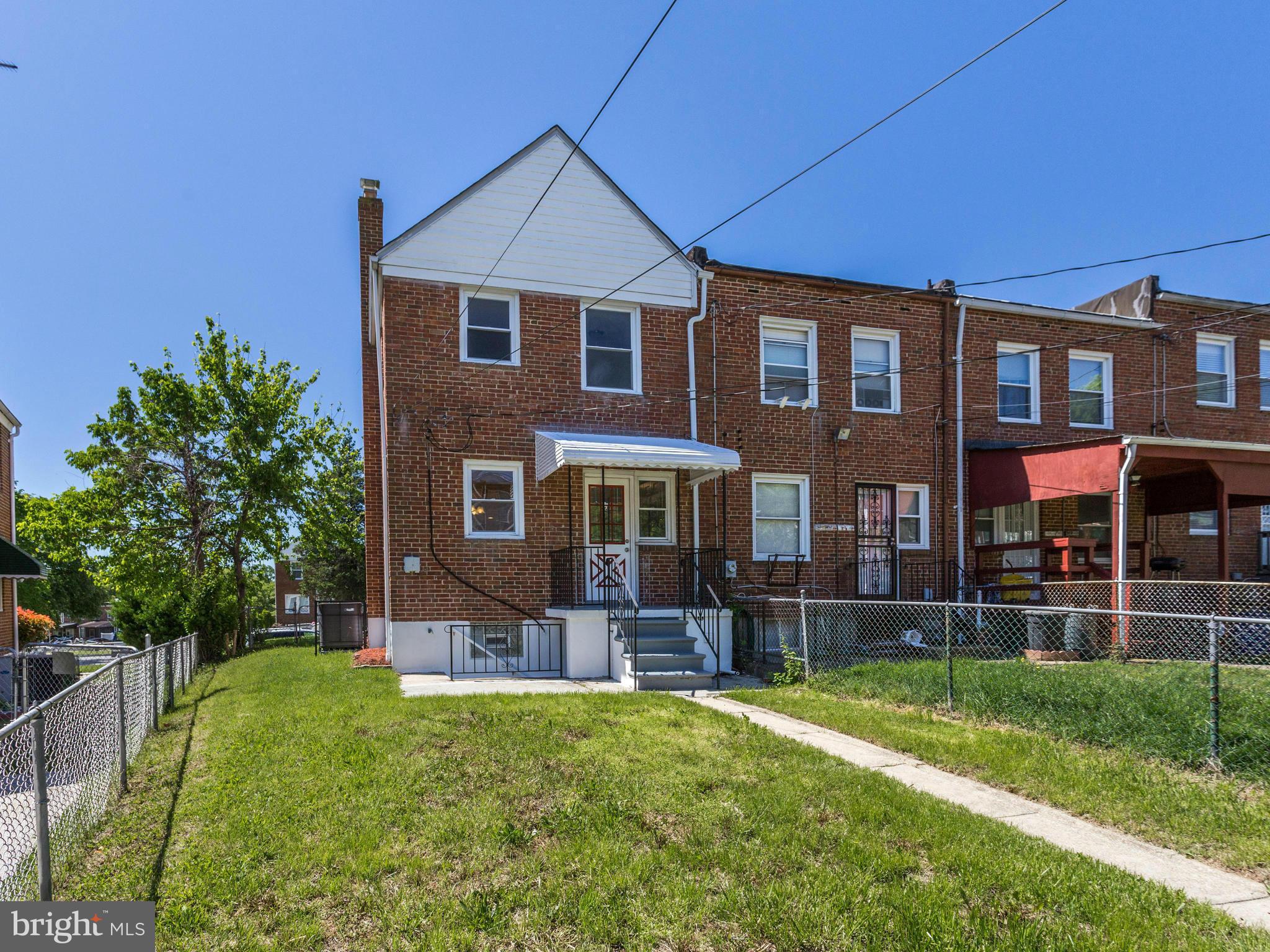 4400 Eldone Road Baltimore, MD 21229 - Photo 29 of 30 front view of a house with a yard