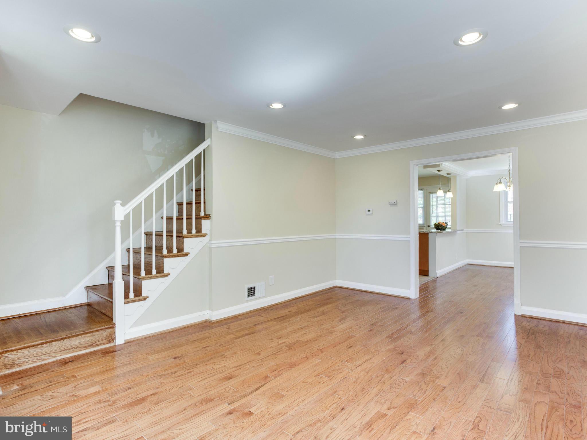 4400 Eldone Road Baltimore, MD 21229 - Photo 8 of 30 a view of an empty room with wooden floor