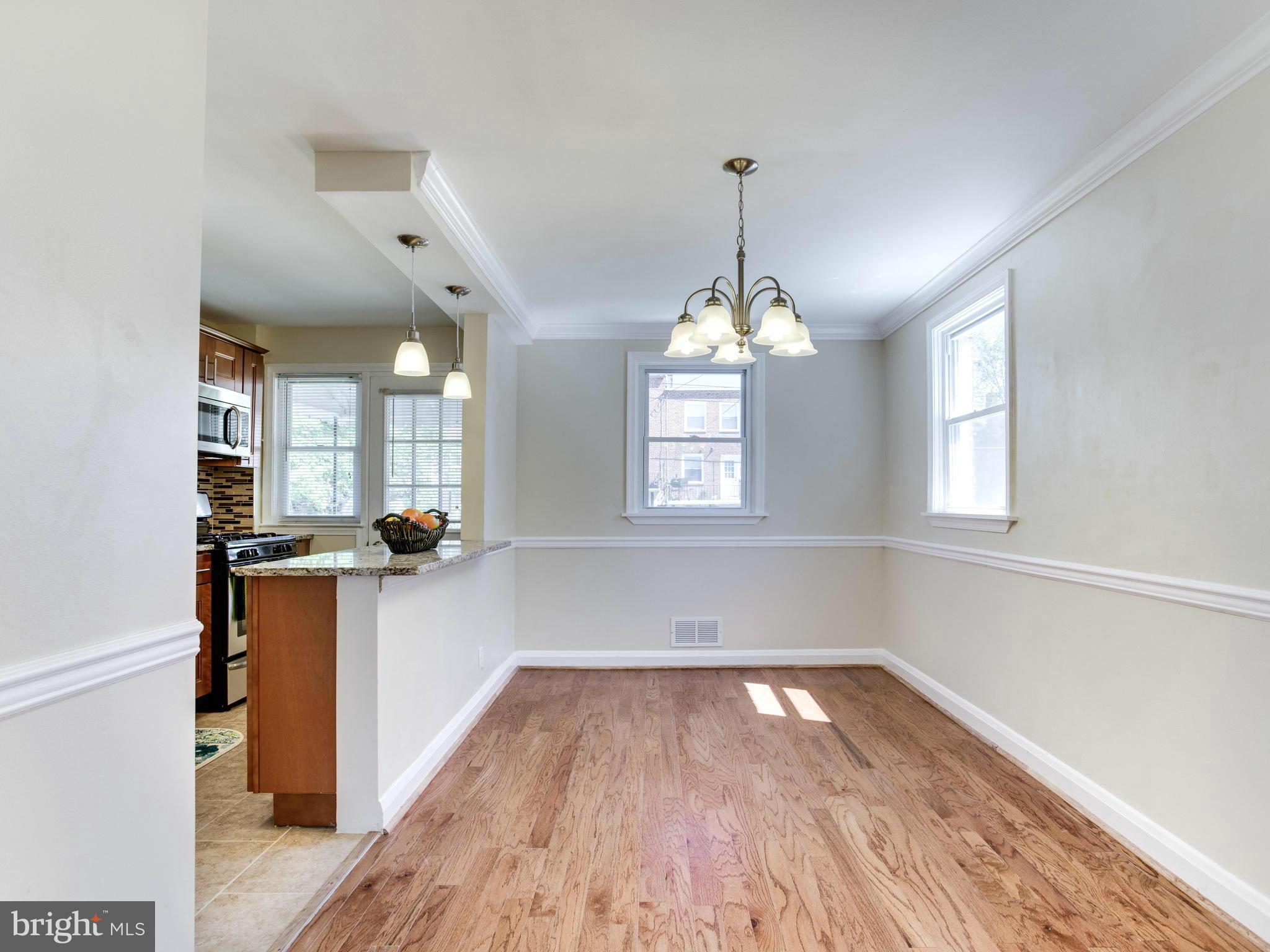 4400 Eldone Road Baltimore, MD 21229 - Photo 9 of 30 a view of a room with wooden floor and windows
