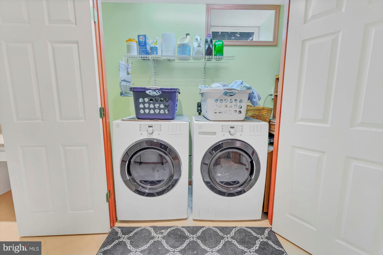 6815 Mackall Road St. Leonard, MD 20685 - Photo 31 of 38 a utility room with dryer and washer