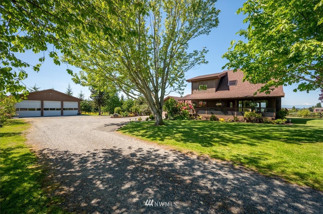 320 East Axton Road Bellingham, WA 98226 - Photo 1 of 40 a front view of a house with a yard
