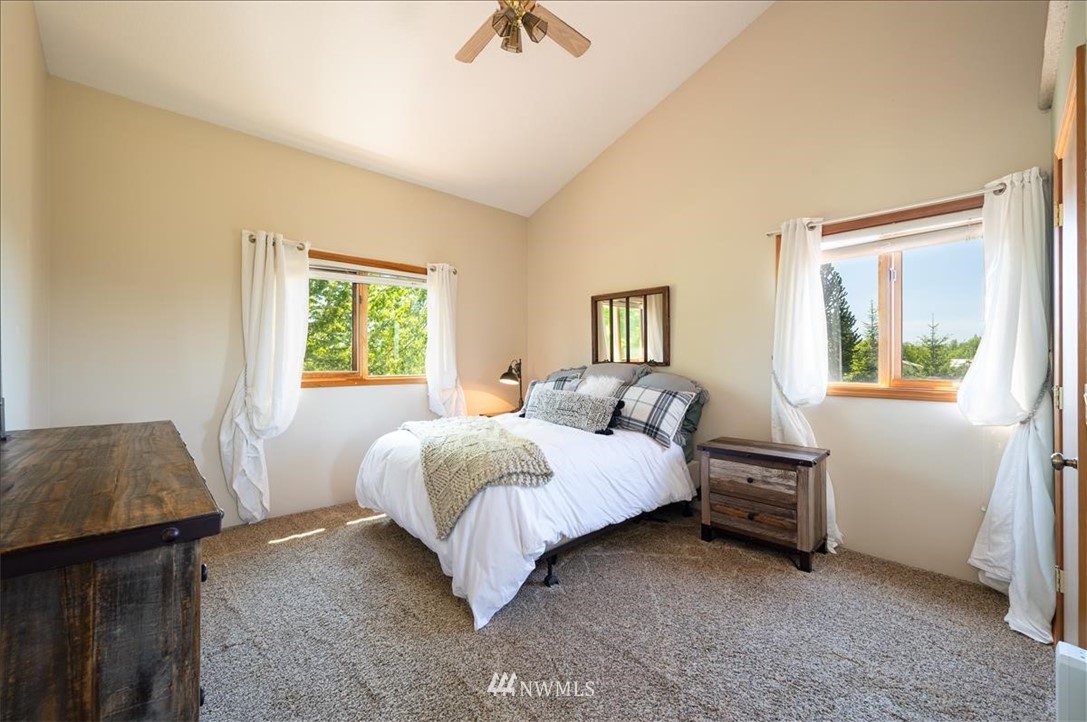 320 East Axton Road Bellingham, WA 98226 - Photo 13 of 40 a bedroom with a bed and a window