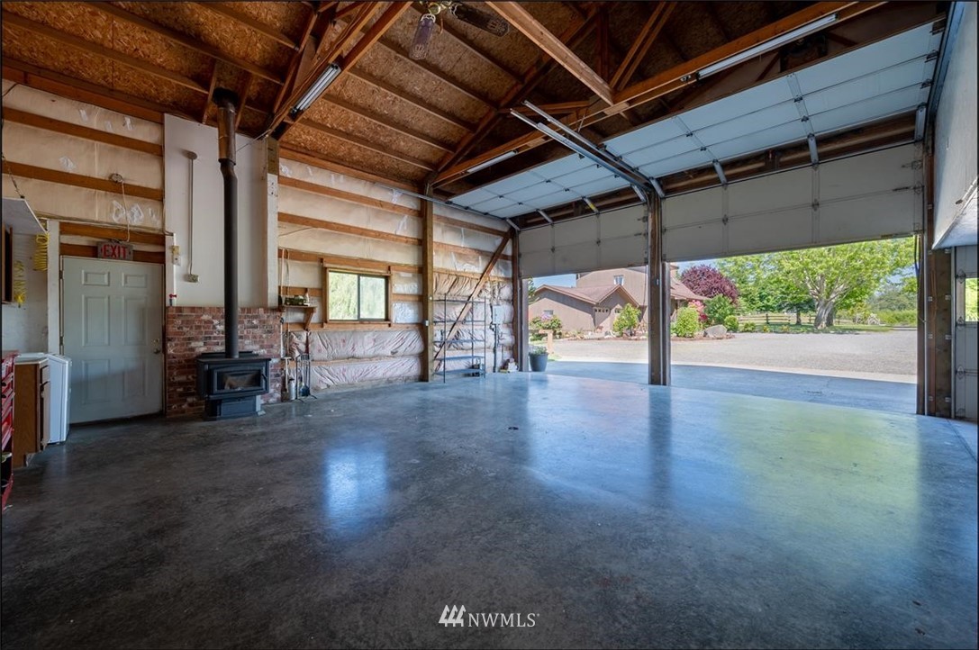 320 East Axton Road Bellingham, WA 98226 - Photo 25 of 40 an empty room with wooden floor and windows