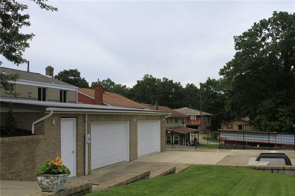 101 Louis Street McKees Rocks, PA 15136 - Photo 23 of 24 garage driveway