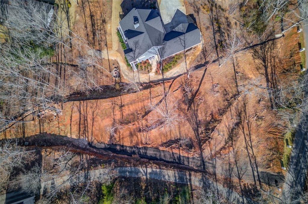 2275 Boy Scout Camp Road Gainesville, GA 30501 - Photo 12 of 20 a backyard of a house with large trees and outdoor seating