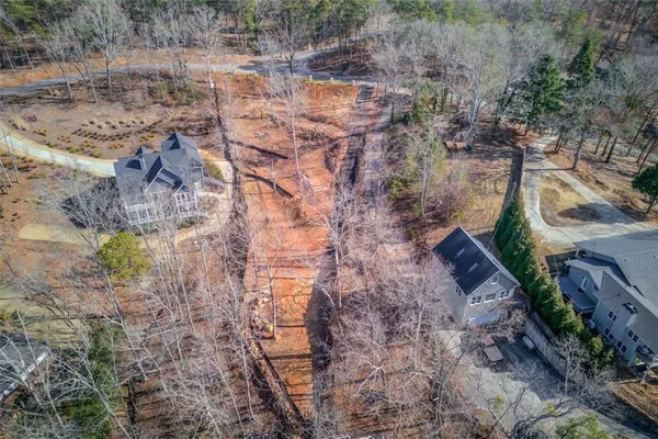 a view of a pathway with a yard