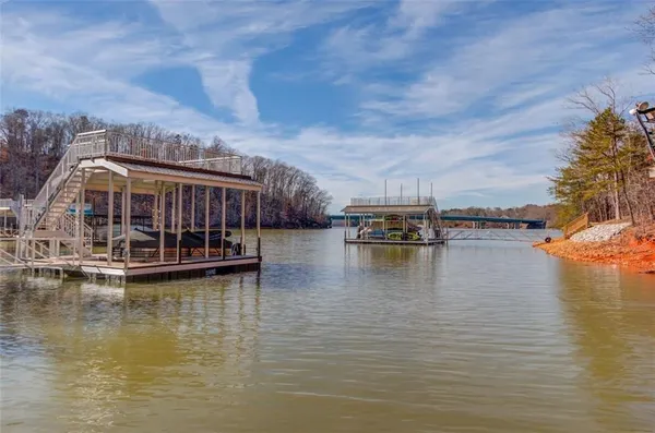 a view of a lake with roof deck
