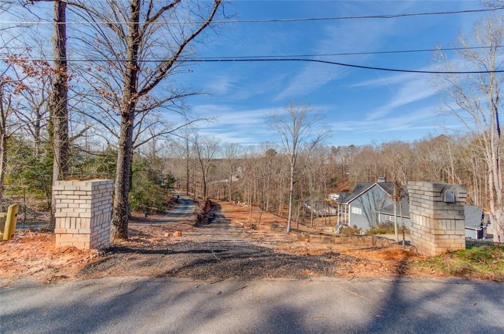 2275 Boy Scout Camp Road Gainesville, GA 30501 - Photo 2 of 20 a view of a road with a snow on the road