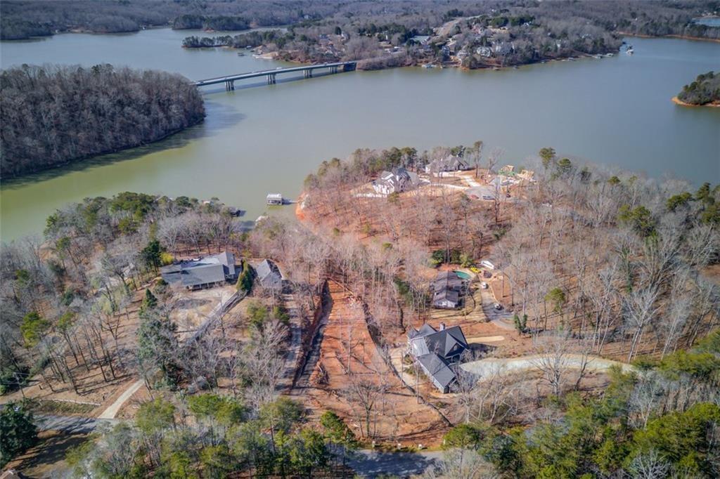 2275 Boy Scout Camp Road Gainesville, GA 30501 - Photo 3 of 20 a aerial view of a house with a yard and lake view