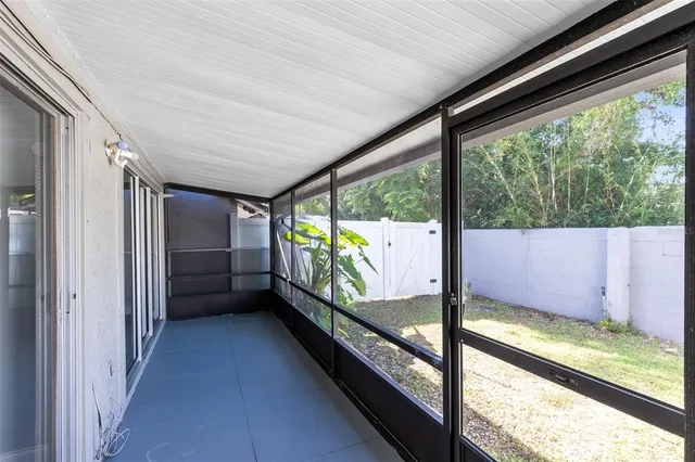 a view of a backyard of the house