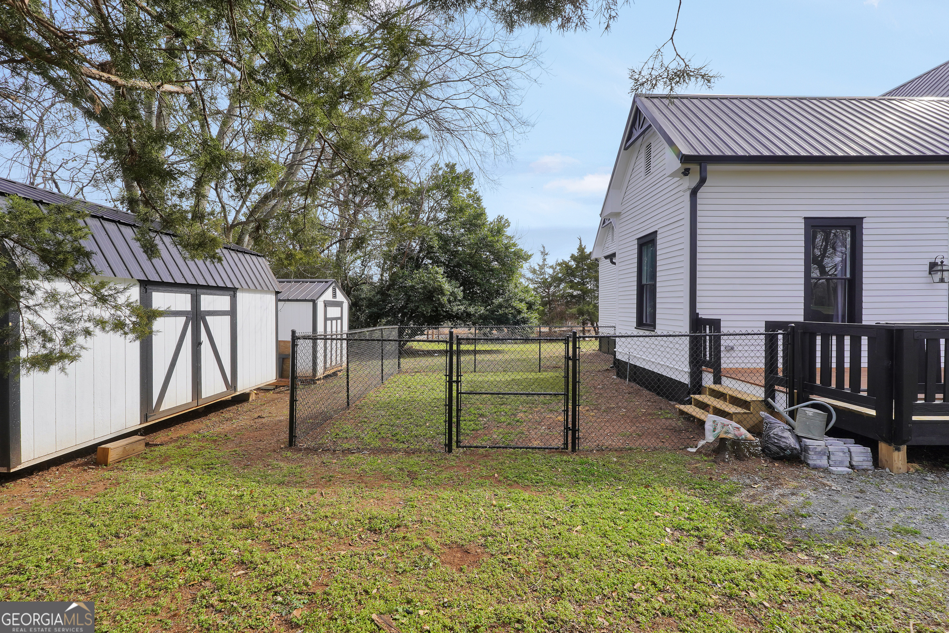 263 Julia Street Monticello, GA 31064 - Photo 49 of 49 a view of backyard with wooden fence
