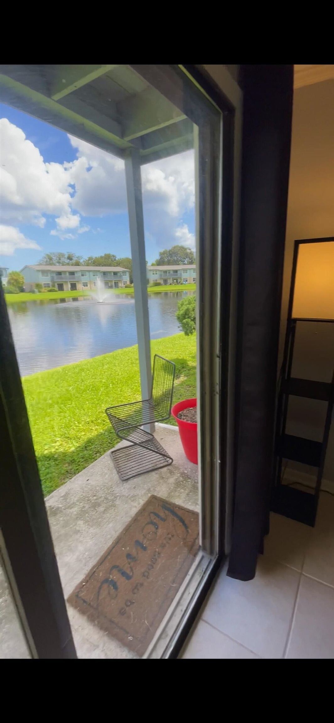 700 West Pope Road, Unit E39 St. Augustine, FL 32080 - Photo 15 of 16 a view of a floor to ceiling window and a yard