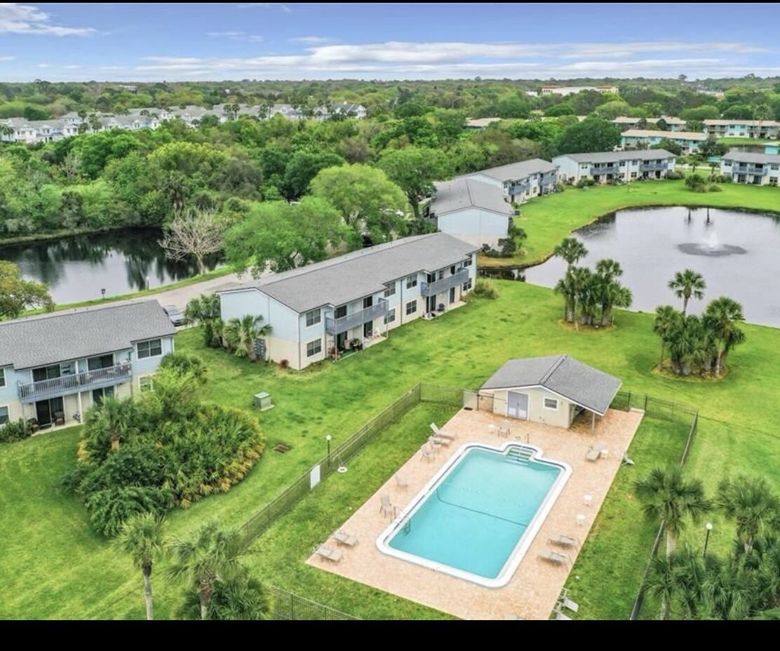 700 West Pope Road, Unit E39 St. Augustine, FL 32080 - Photo 16 of 16 an aerial view of a house with a garden