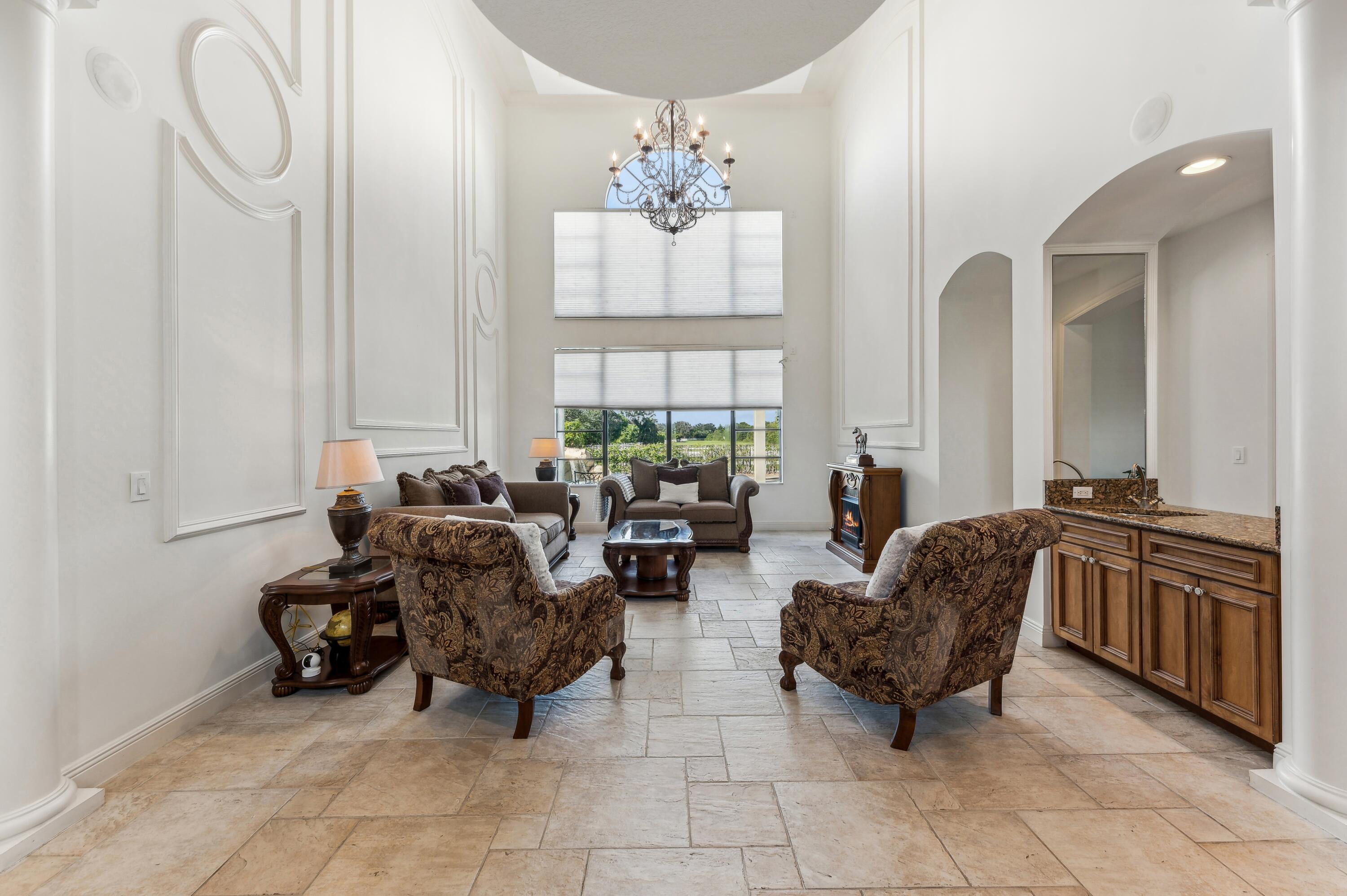 8871 Equus Circle Boynton Beach, FL 33472 - Photo 13 of 64 Entrance/ Living Room