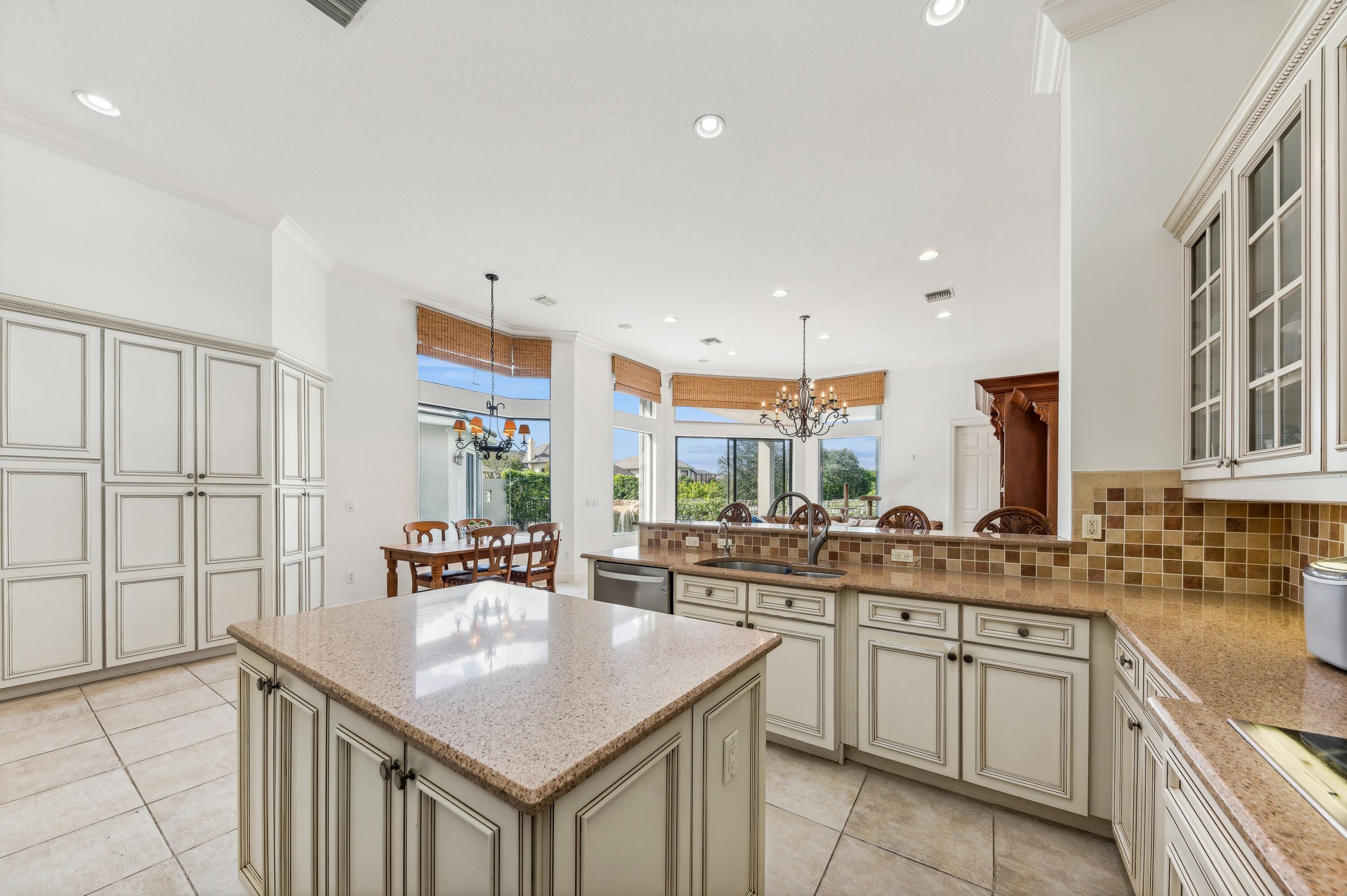 8871 Equus Circle Boynton Beach, FL 33472 - Photo 30 of 64 12_8871EquusCircle_191002_KitchenBreakfa