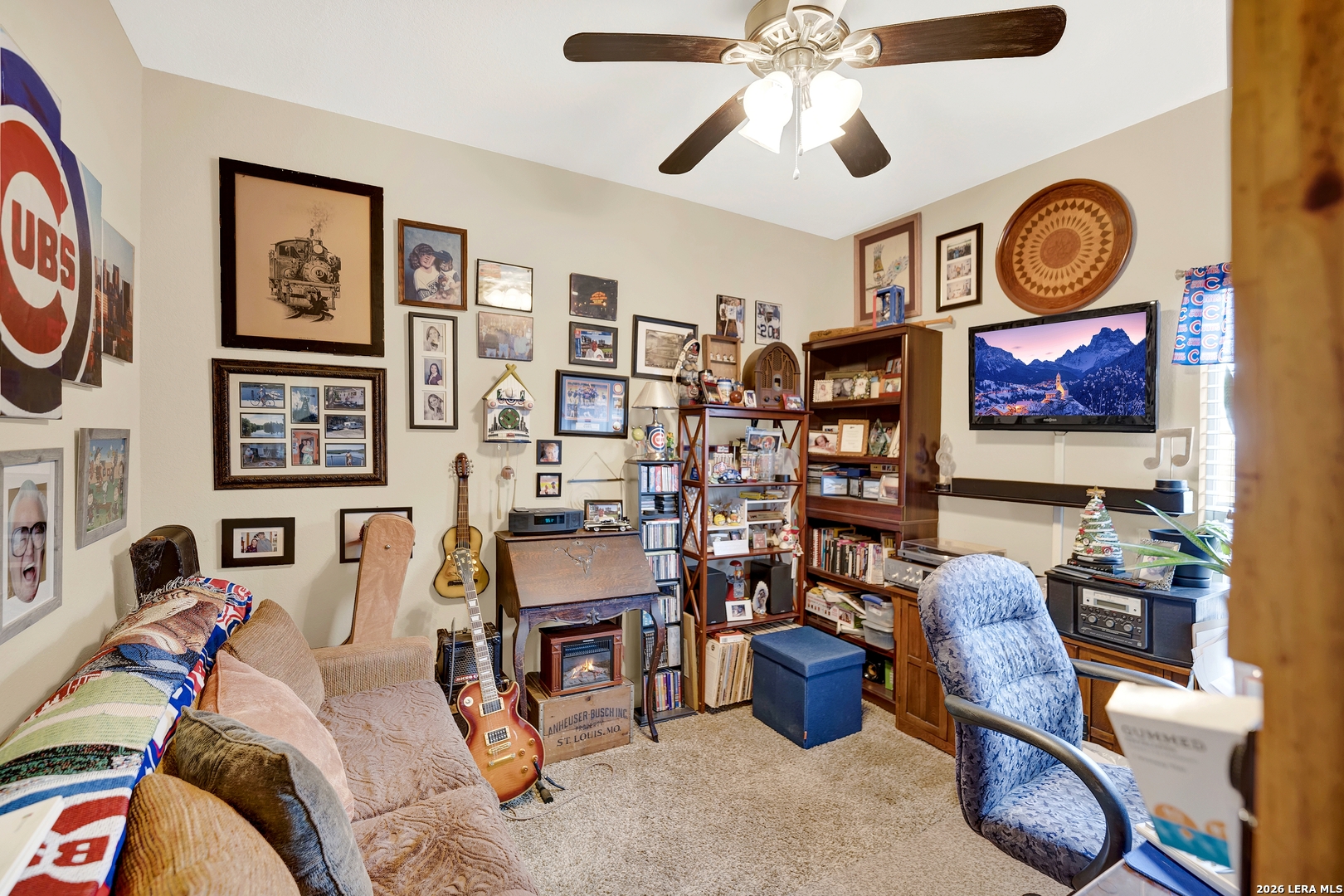 11669 Flores Avenue LaCoste, TX 78039 - Photo 12 of 36 a living room with furniture and a clock