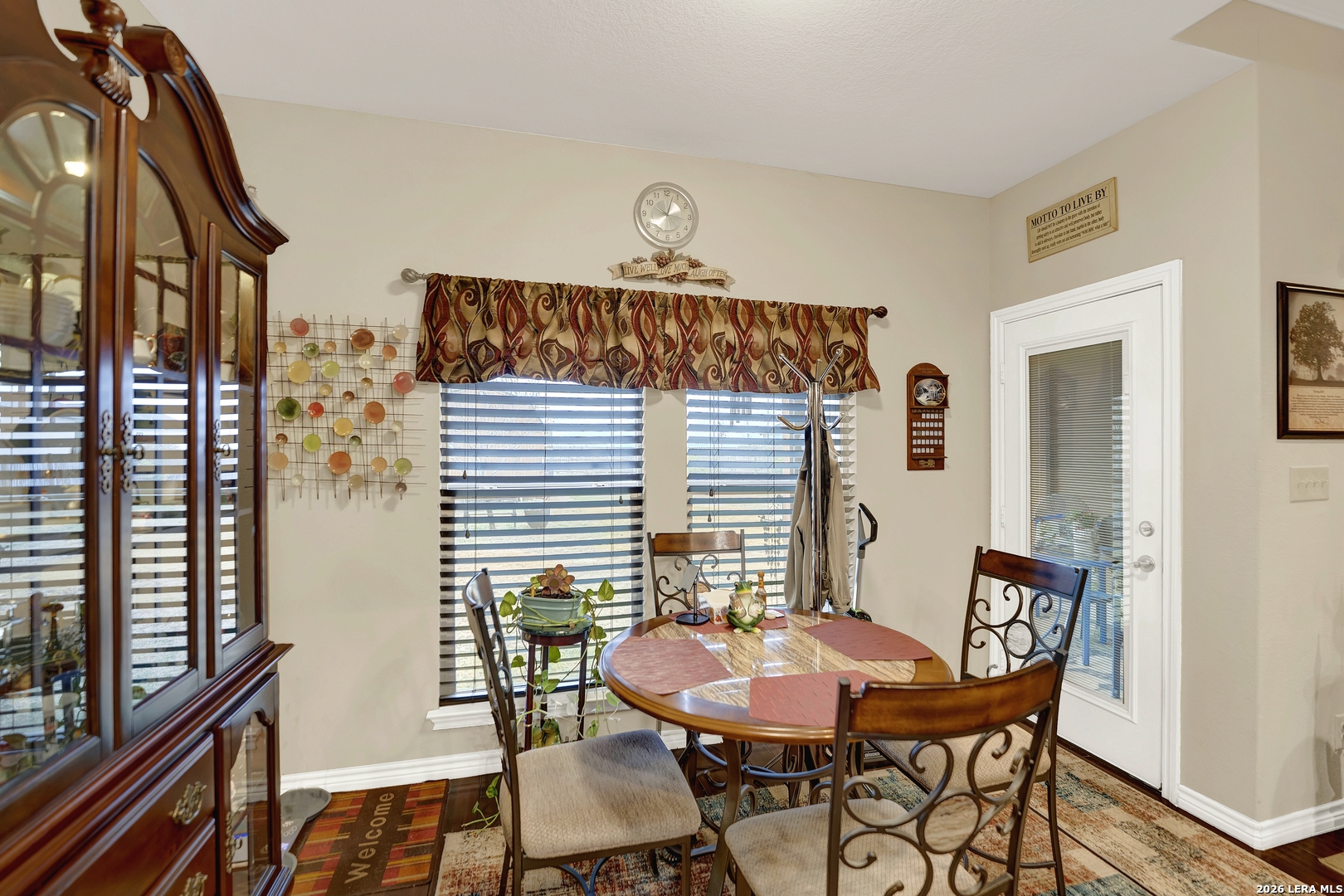 11669 Flores Avenue LaCoste, TX 78039 - Photo 27 of 36 a view of a dining room with furniture and window