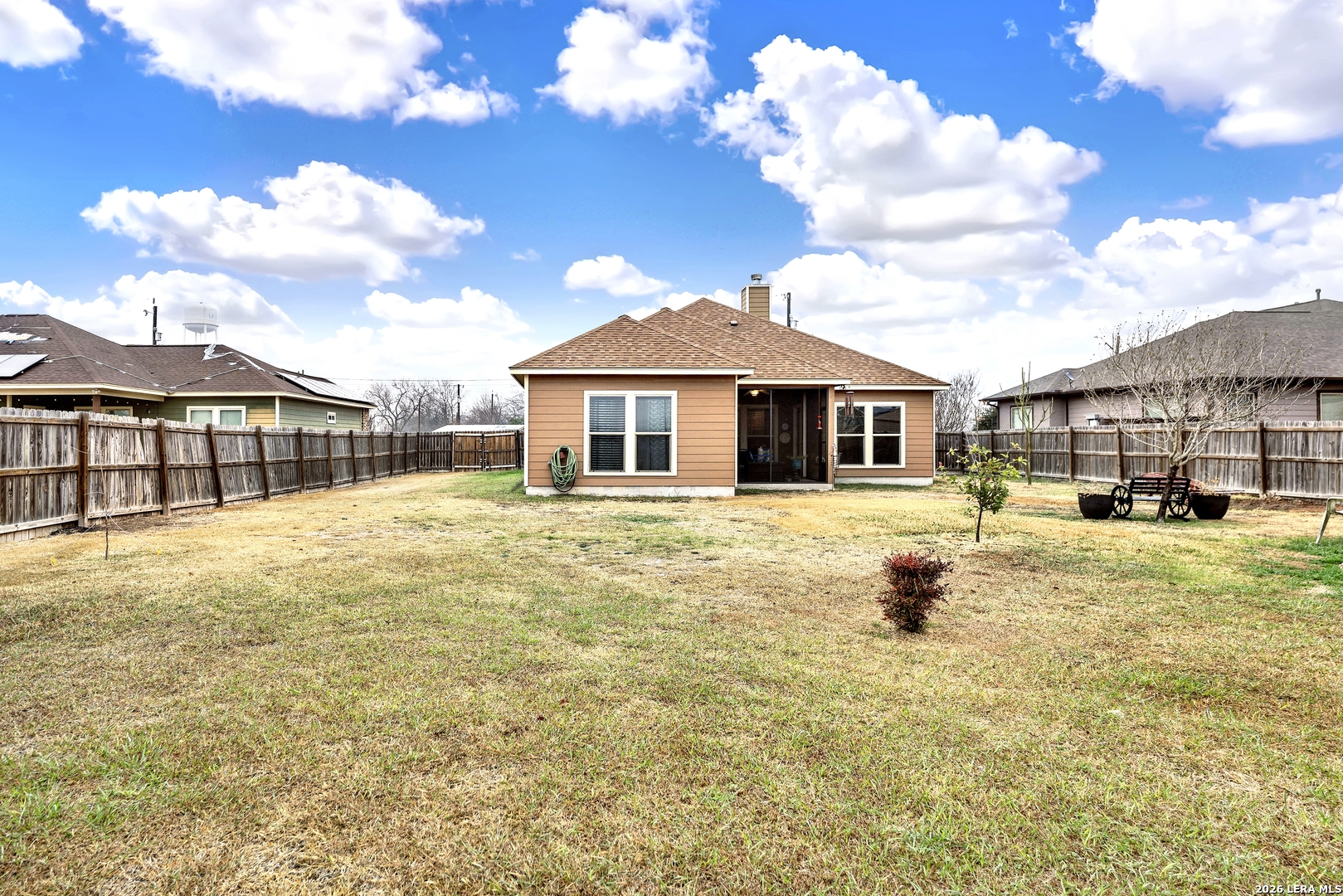 11669 Flores Avenue LaCoste, TX 78039 - Photo 6 of 36 a front view of a house with swimming pool