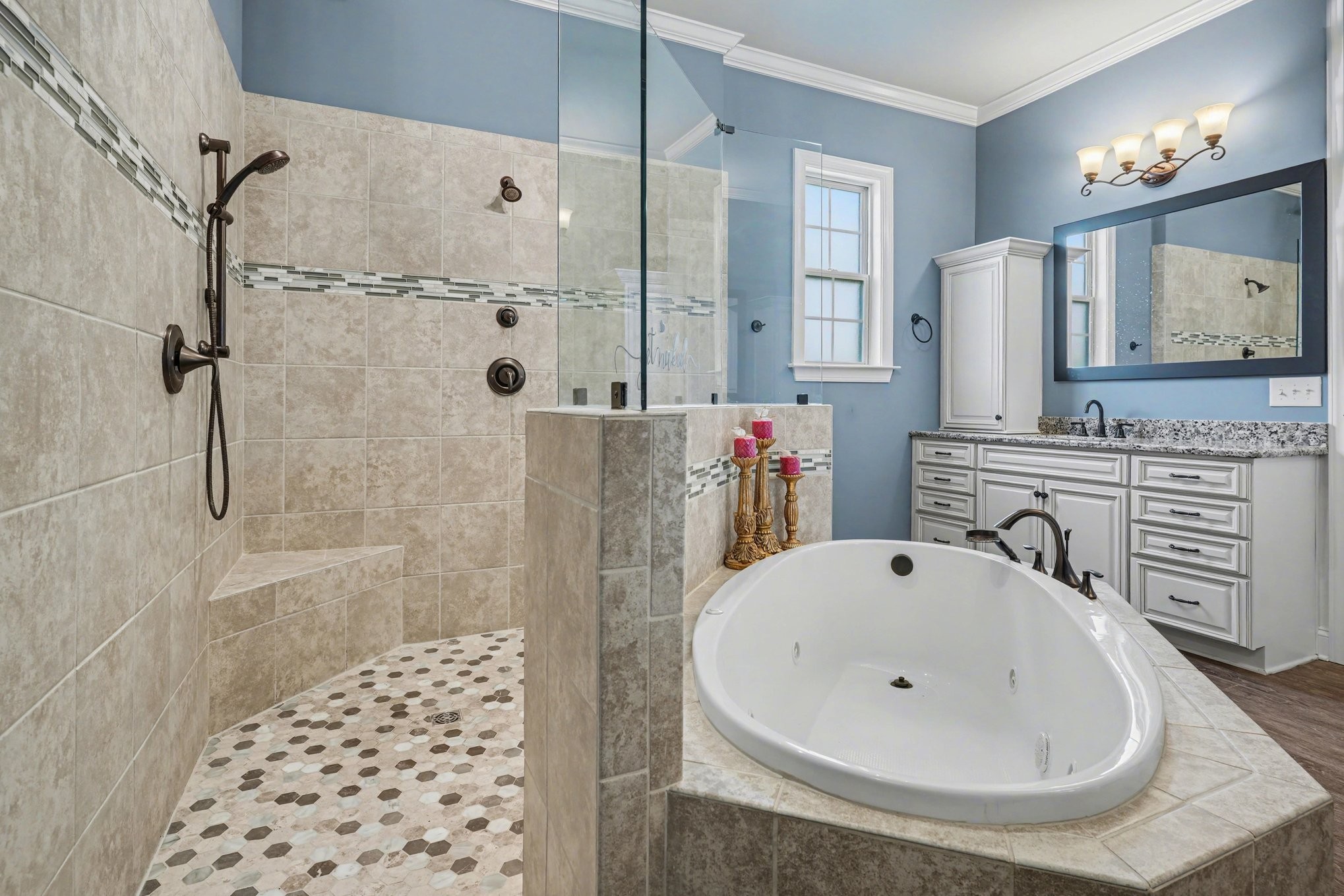 5094 Moss Road Nashville, TN 37221 - Photo 23 of 29 a bathroom with a sink and a mirror