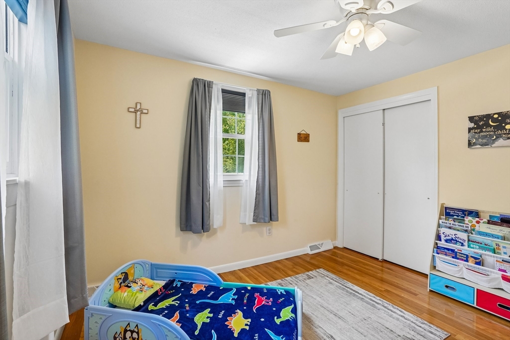 35 Westgate Road Framingham, MA 01701 - Photo 21 of 37 a bedroom with a bed and a window