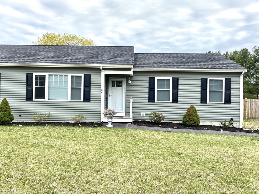 8 Mill Street, Unit B Wareham, MA 02576 - Photo 1 of 30 a view of a house with a yard