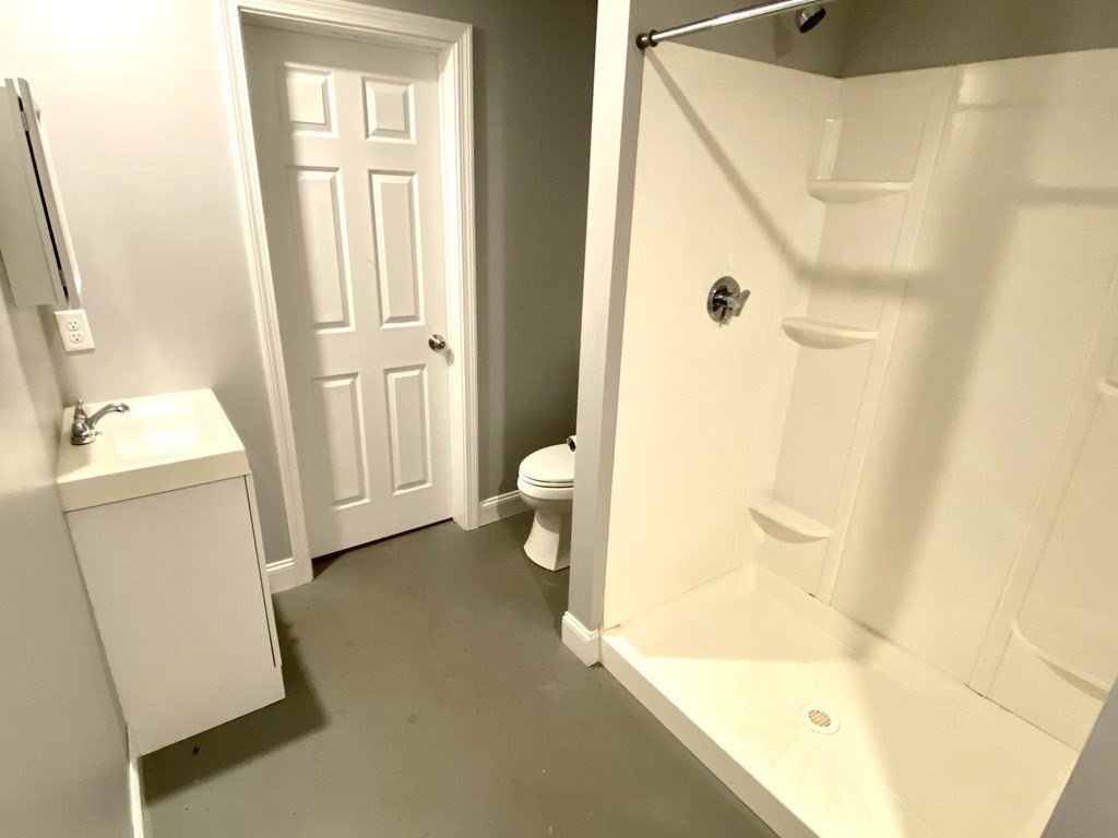 8 Mill Street, Unit B Wareham, MA 02576 - Photo 22 of 30 a bathroom with a bathtub and a shower