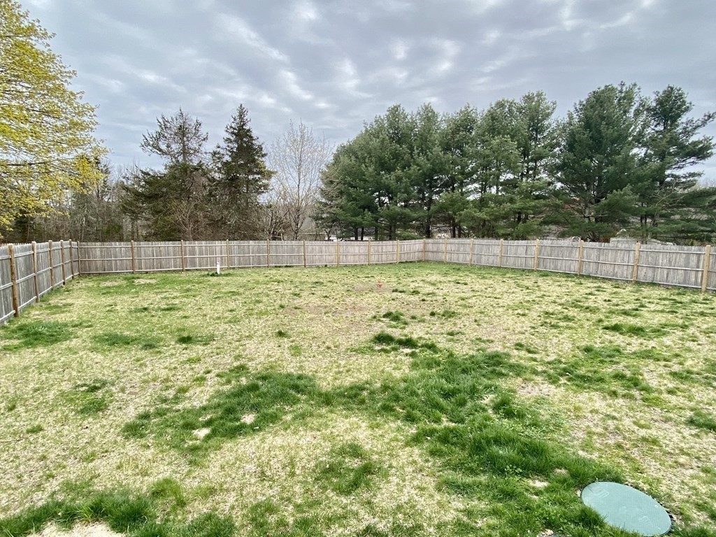 8 Mill Street, Unit B Wareham, MA 02576 - Photo 23 of 30 a swimming pool with outdoor seating and yard