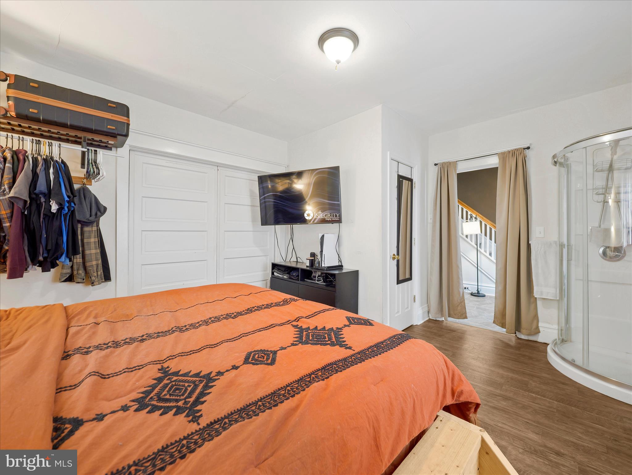 5825 Front Street Chambersburg, PA 17202 - Photo 17 of 37 a bedroom with a bed and a bathroom