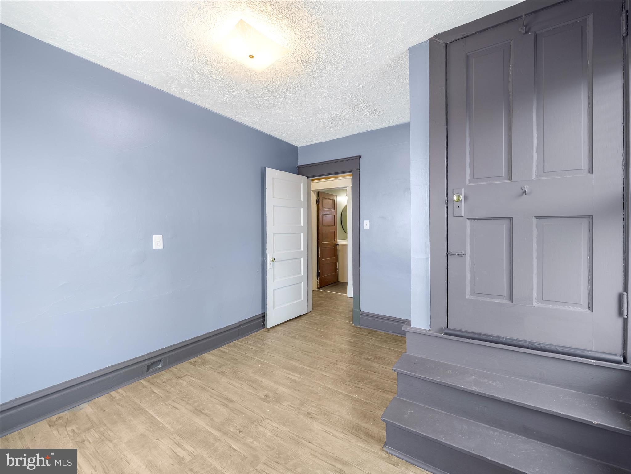 5825 Front Street Chambersburg, PA 17202 - Photo 21 of 37 a view of an entryway with wooden floor