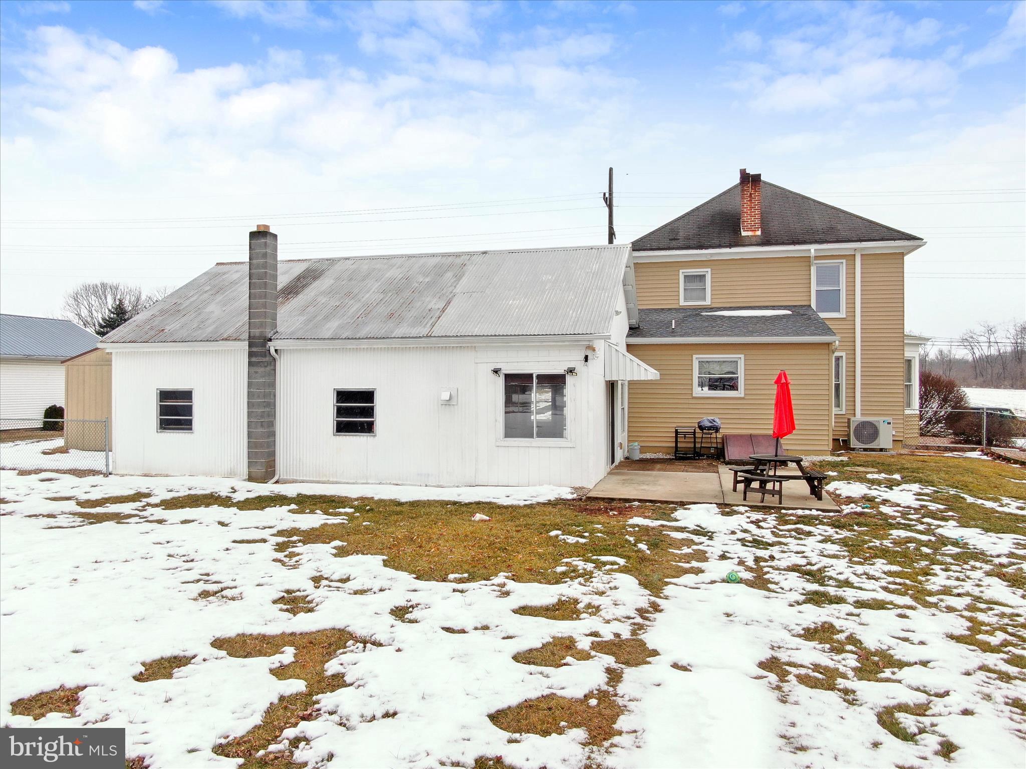 5825 Front Street Chambersburg, PA 17202 - Photo 36 of 37 a view of a house with snow on the road