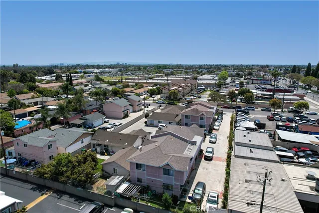 an aerial view of a city with lots of residential buildings