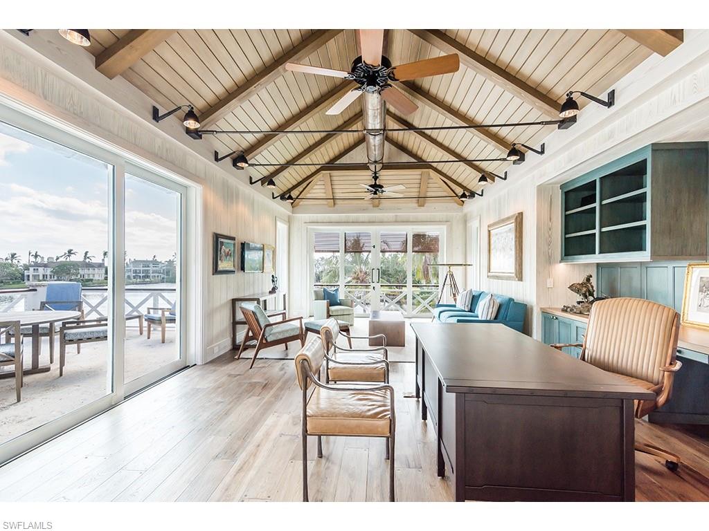 4296 Cutlass Lane Naples, FL 34102 - Photo 26 of 35 a view of a dining room with furniture window and outside view