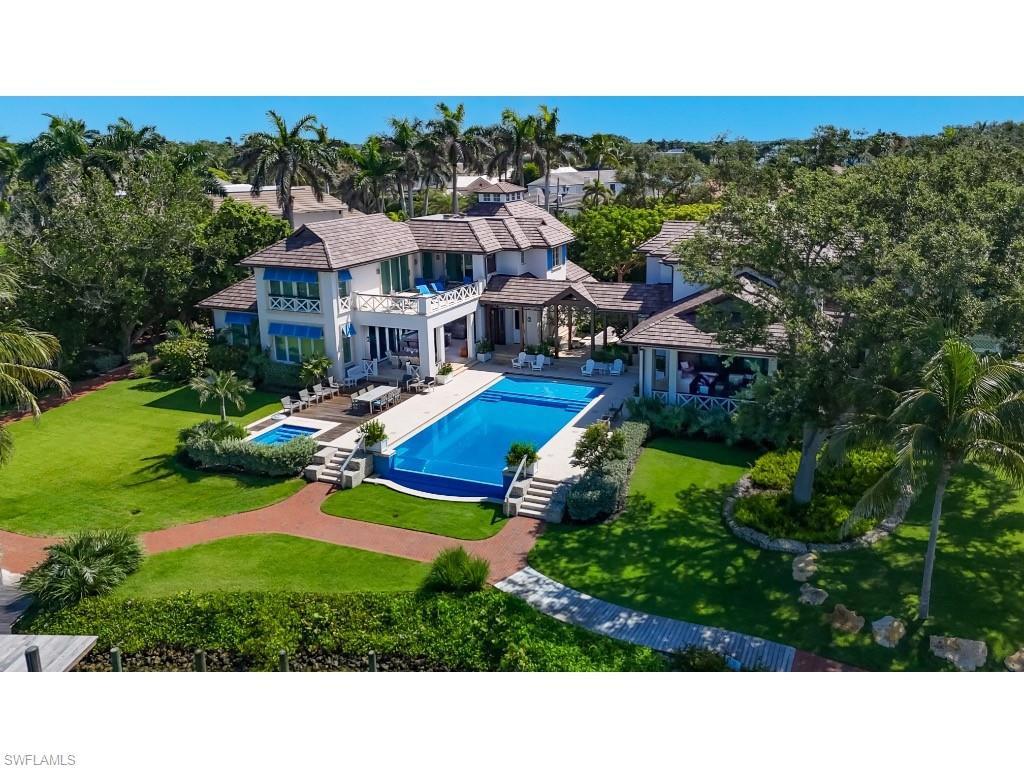 4296 Cutlass Lane Naples, FL 34102 - Photo 33 of 35 a house view with a garden space