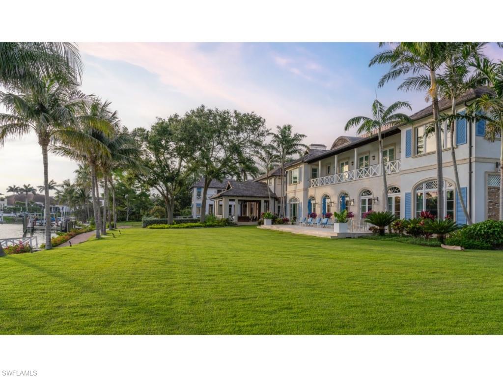 4296 Cutlass Lane Naples, FL 34102 - Photo 4 of 35 a black and white photo of a big room