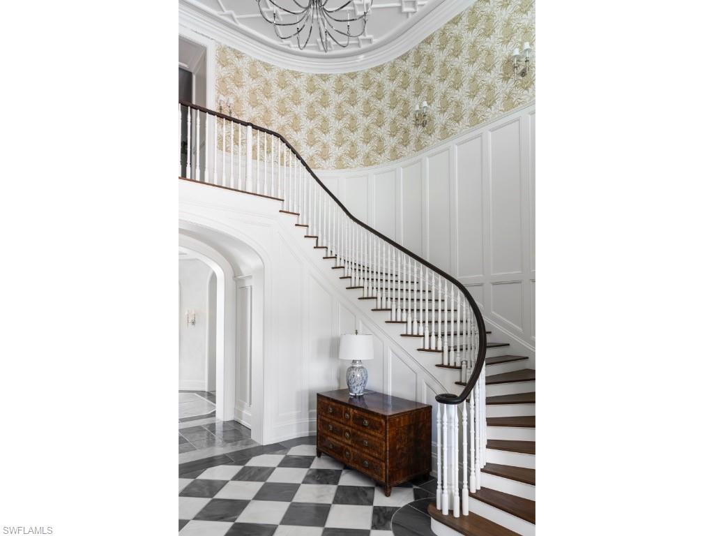 4296 Cutlass Lane Naples, FL 34102 - Photo 7 of 35 a view of entryway with a front door