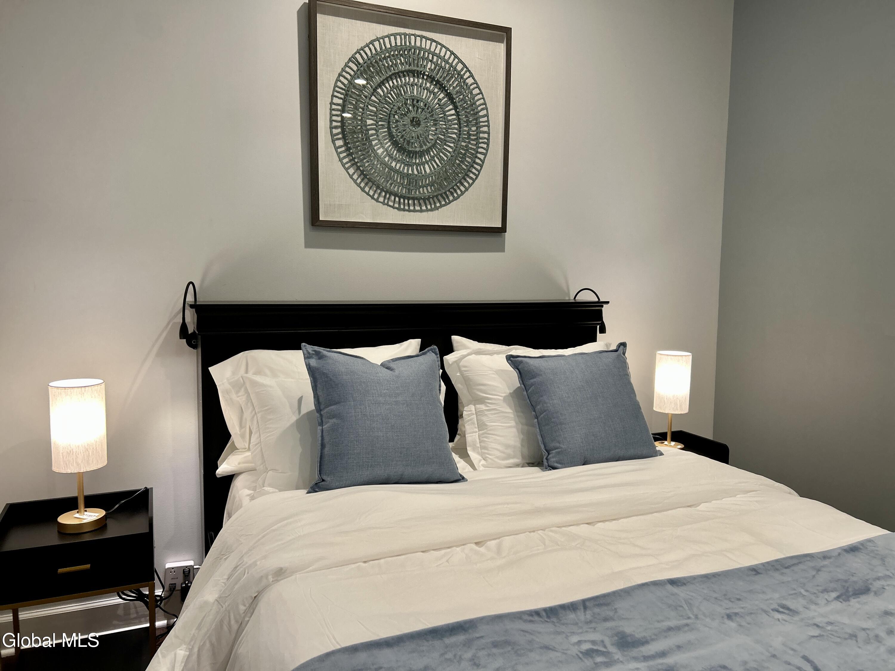 5 Spring Street, Unit 101 Saratoga Springs, NY 12866 - Photo 14 of 25 Queen Bed with Brand new bedding!