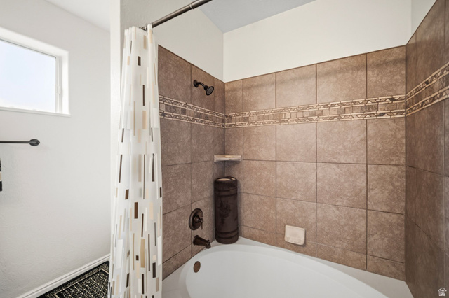 1985 West Rivers Edge Lane St. George, UT 84770 - Photo 29 of 42 Full bathroom featuring shower / bathtub combination with curtain