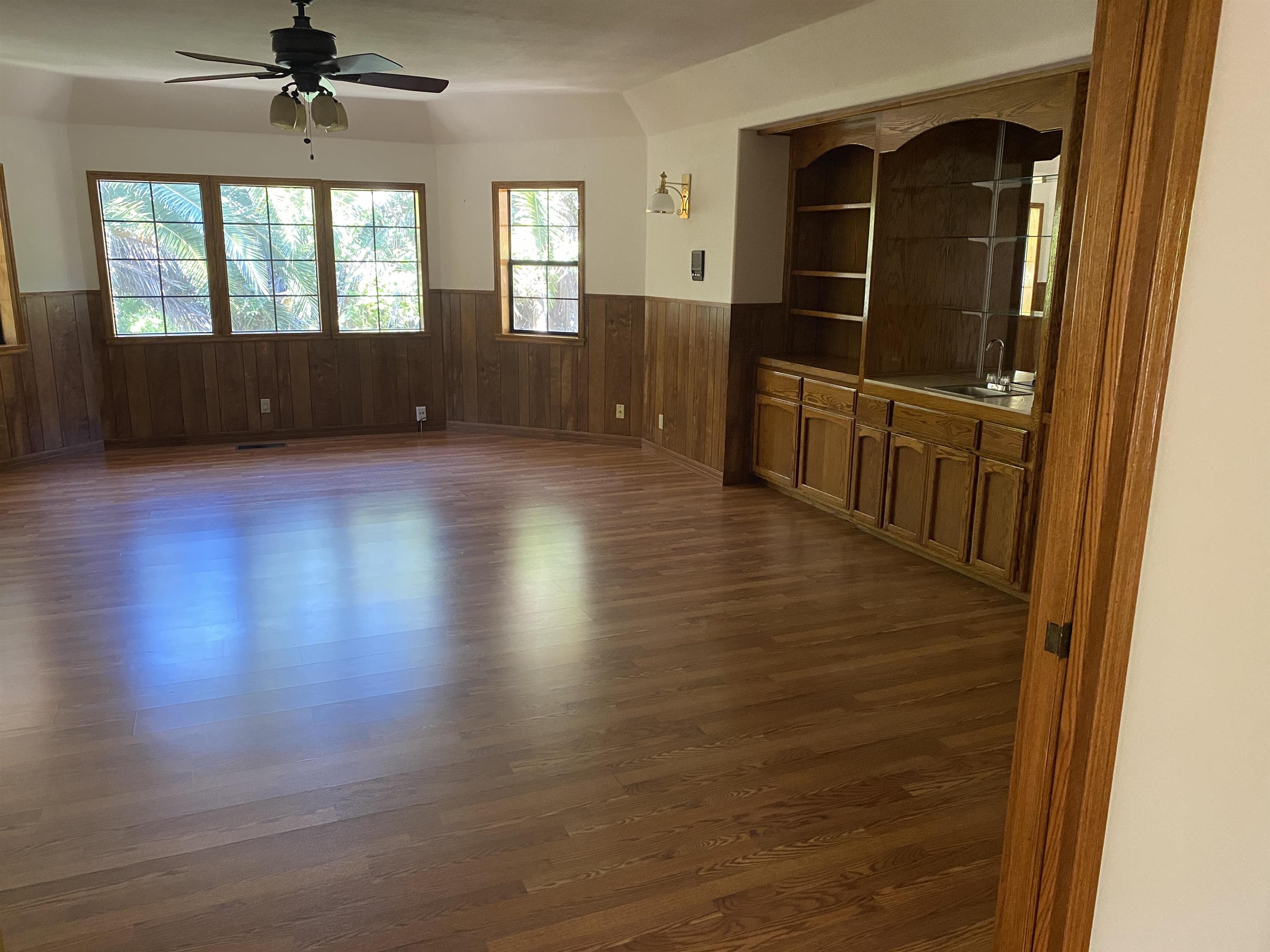 11 Foothill Lane Pleasanton, CA 94588 - Photo 10 of 38 an empty room with wooden floor and windows