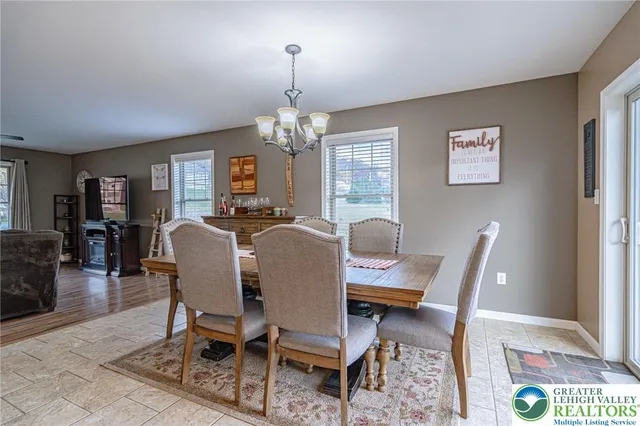 a view of a dining room with furniture