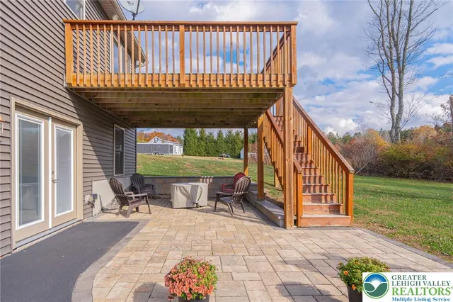 a view of balcony with furniture