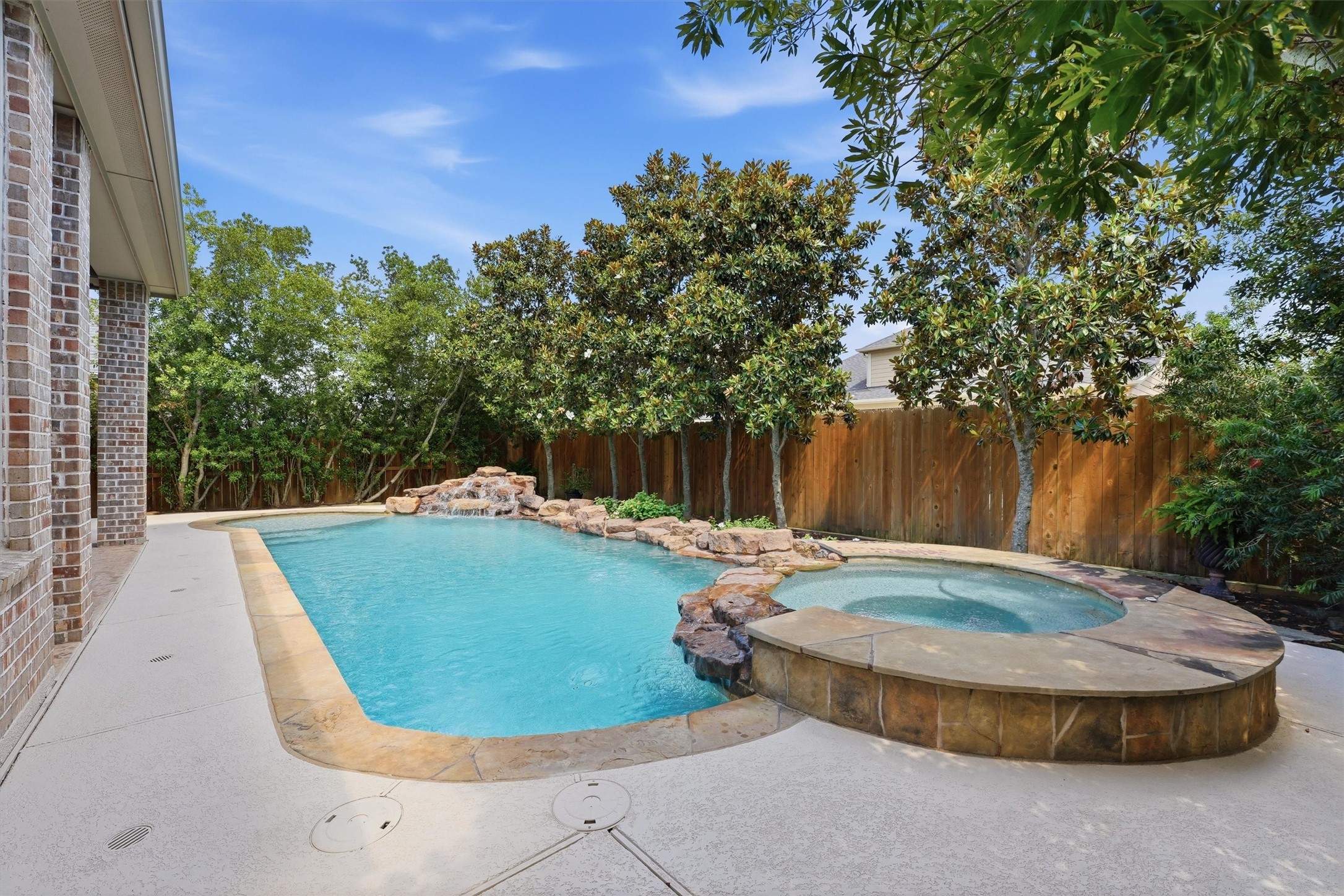 27118 Cross Pointe Court Fulshear, TX 77441 - Photo 23 of 40 Heated pool and spa