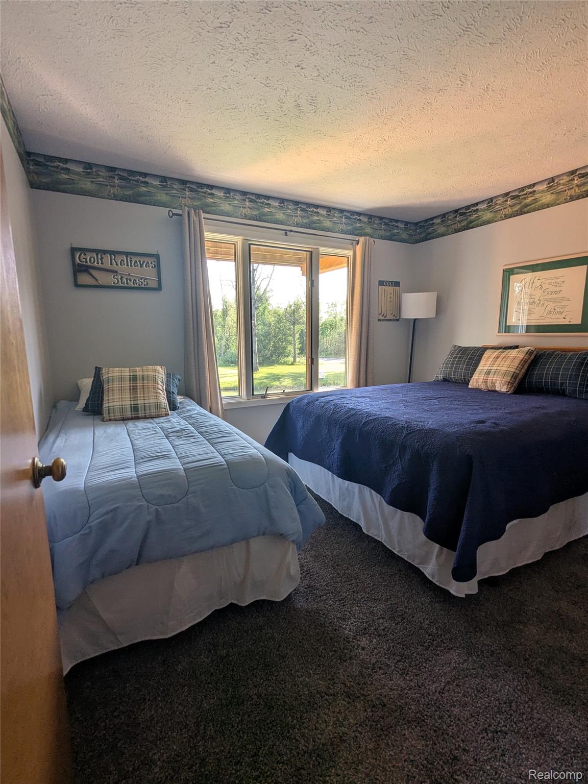 4749 South Pleasantview Road, Unit 20 Harbor Springs, MI 49740 - Photo 15 of 44 One of Two Bedrooms on Main Level. Has Direct Access to the Bathroom and Large Closet