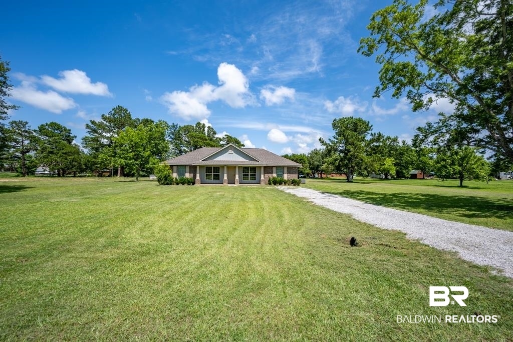 15874 Carver Road, Unit C Foley, AL 36535 - Photo 4 of 18 View of front facade featuring a front yard