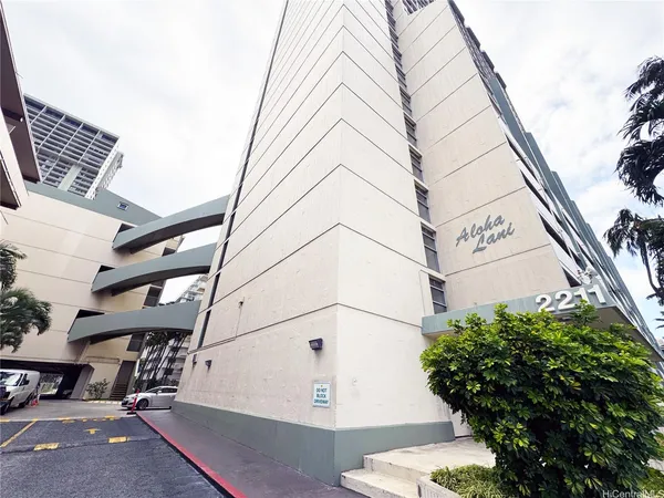a view of room with window and hardwood floor