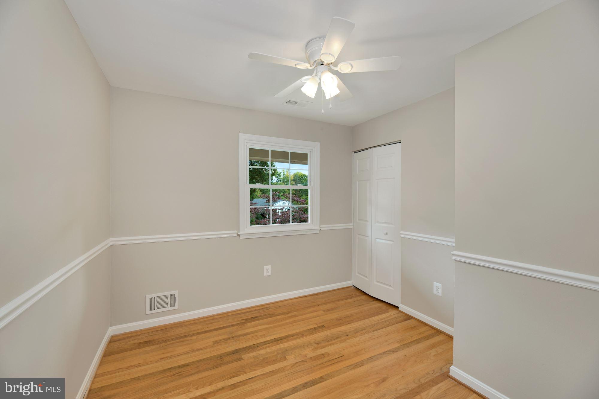 6012 Commack Court Springfield, VA 22152 - Photo 28 of 56 Third bedroom with hardwood floors